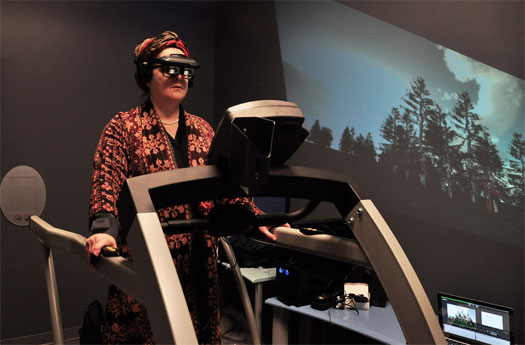 Dr. Diane Gromala of SFU's School of Interactive Arts and Technology demonstrates how virtual reality can ease chronic pain. PHOTO CREDIT: SFU